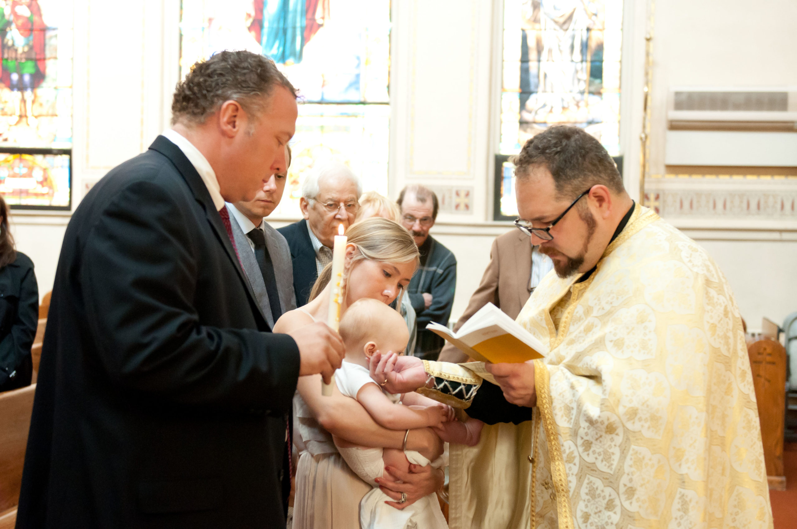 Priest Baptizing Baby at St Mary's Orthodox Cathedral