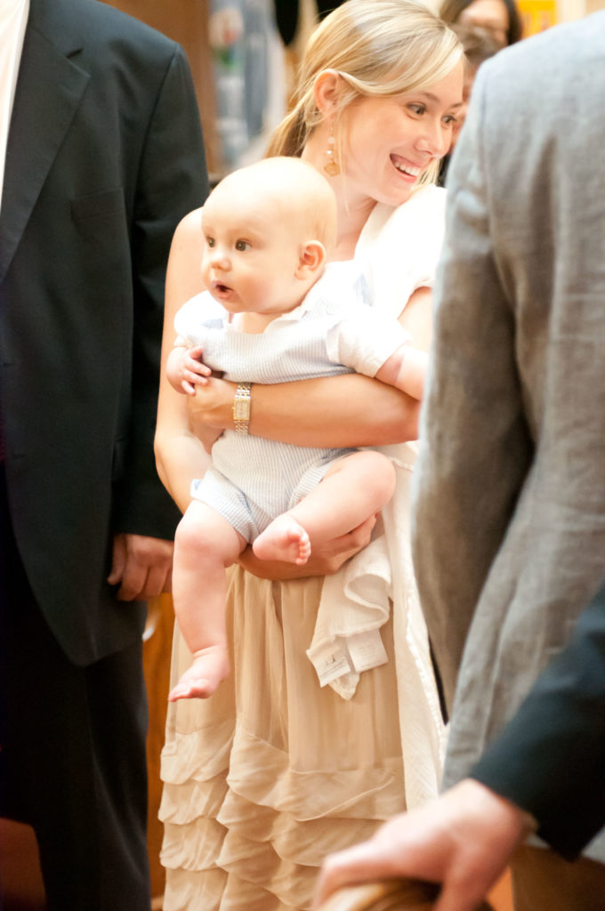 Mother and baby at baptism in Minnesota