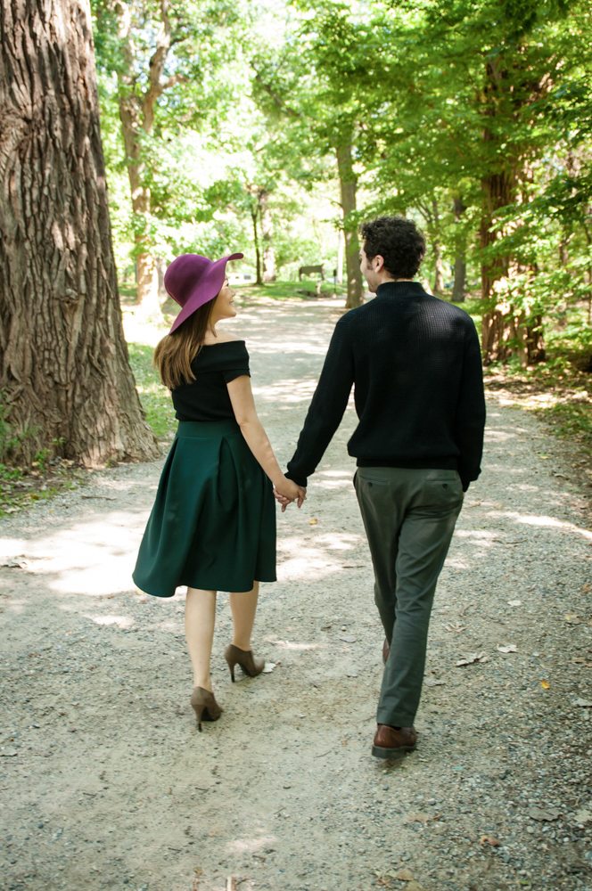 Couple walking into woods 