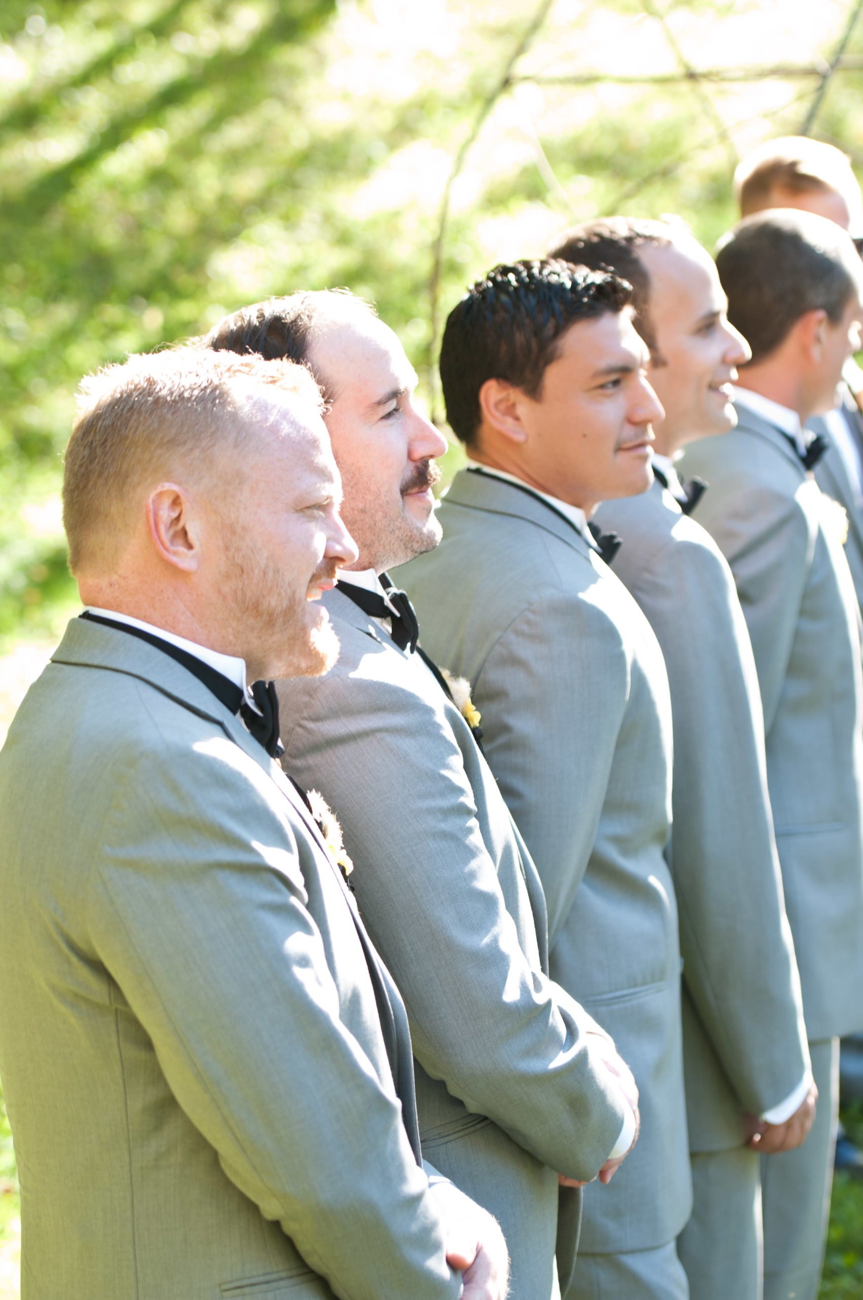 Groomsmen during wedding ceremony in Minnesota