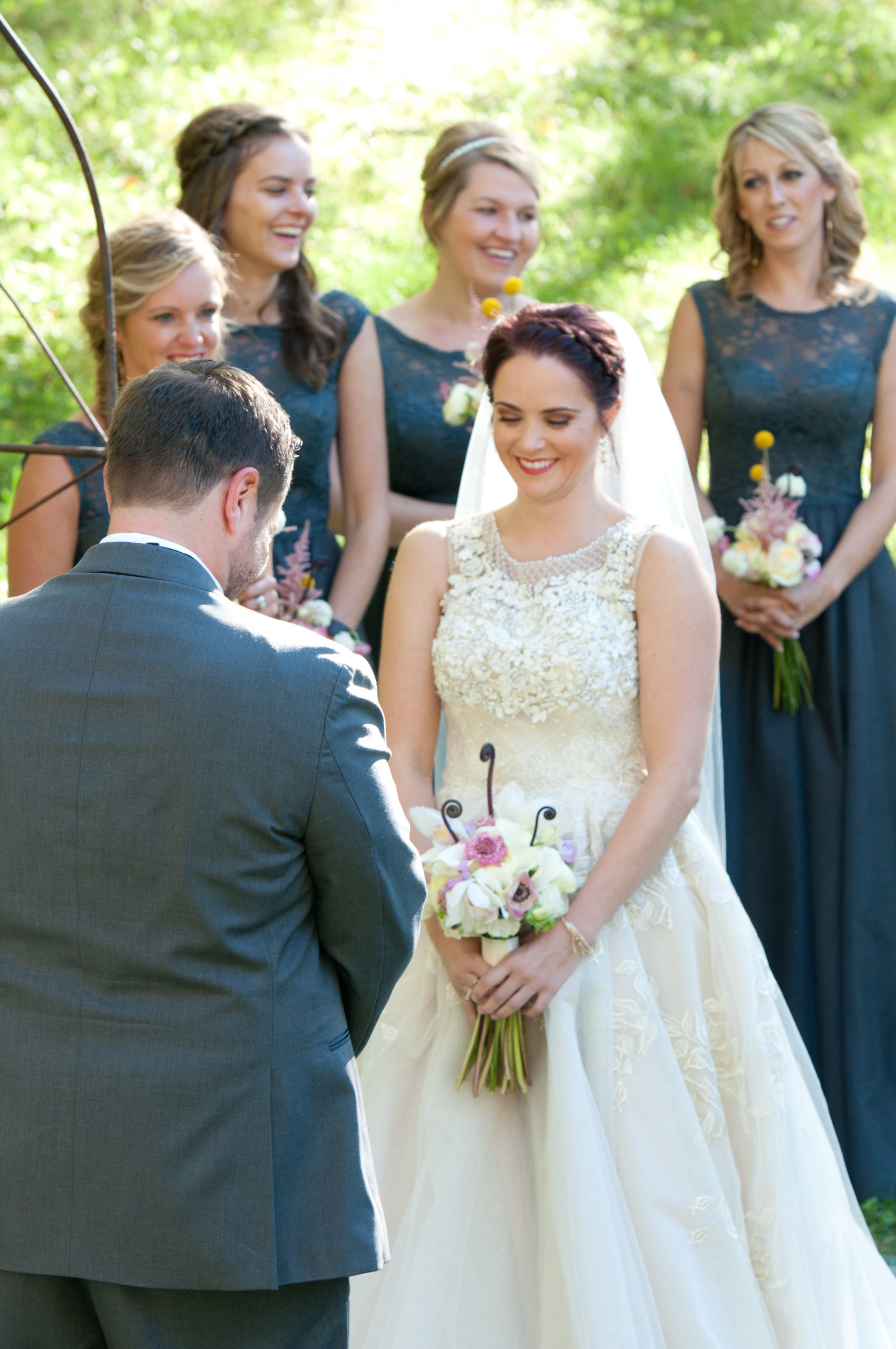 Bride smiling at groom during ceremony in Minnesota