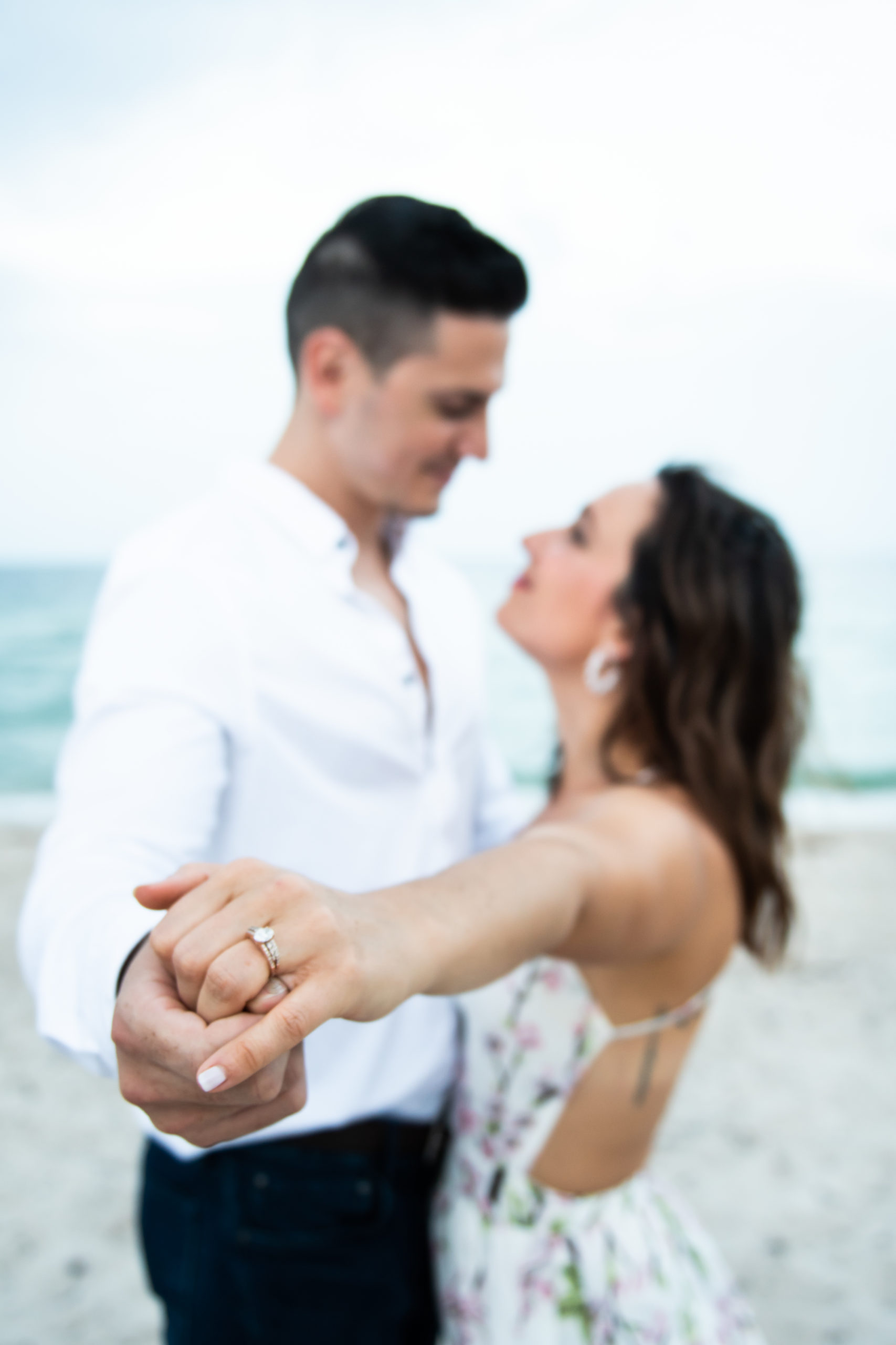 Couple dancing on beach in Fort Lauderdale, Florida