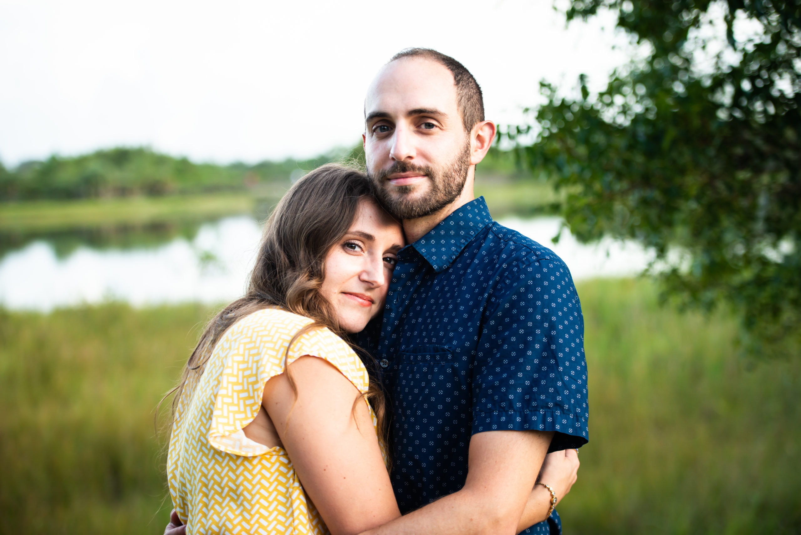 Engaged couple hugging in Plantation Florida