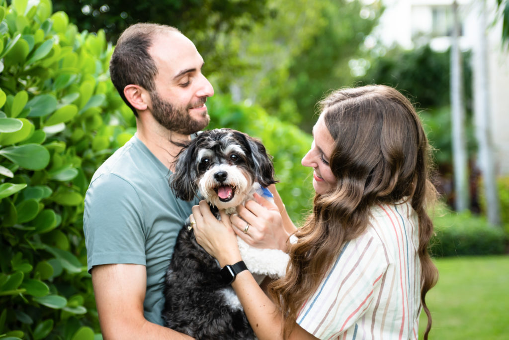 Couple happy in love with puppy