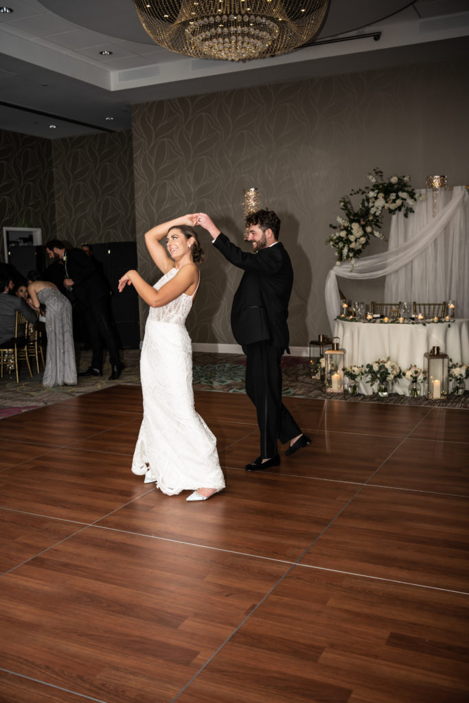 Bride and groom dancing at wedding ceremony at Wyndham Grand Jupiter 