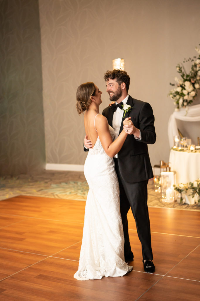 Bride and groom dancing at wedding reception at Wyndham Grand Jupiter 