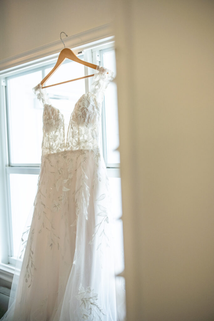 Wedding gown hanging in bridal suite at Florida wedding